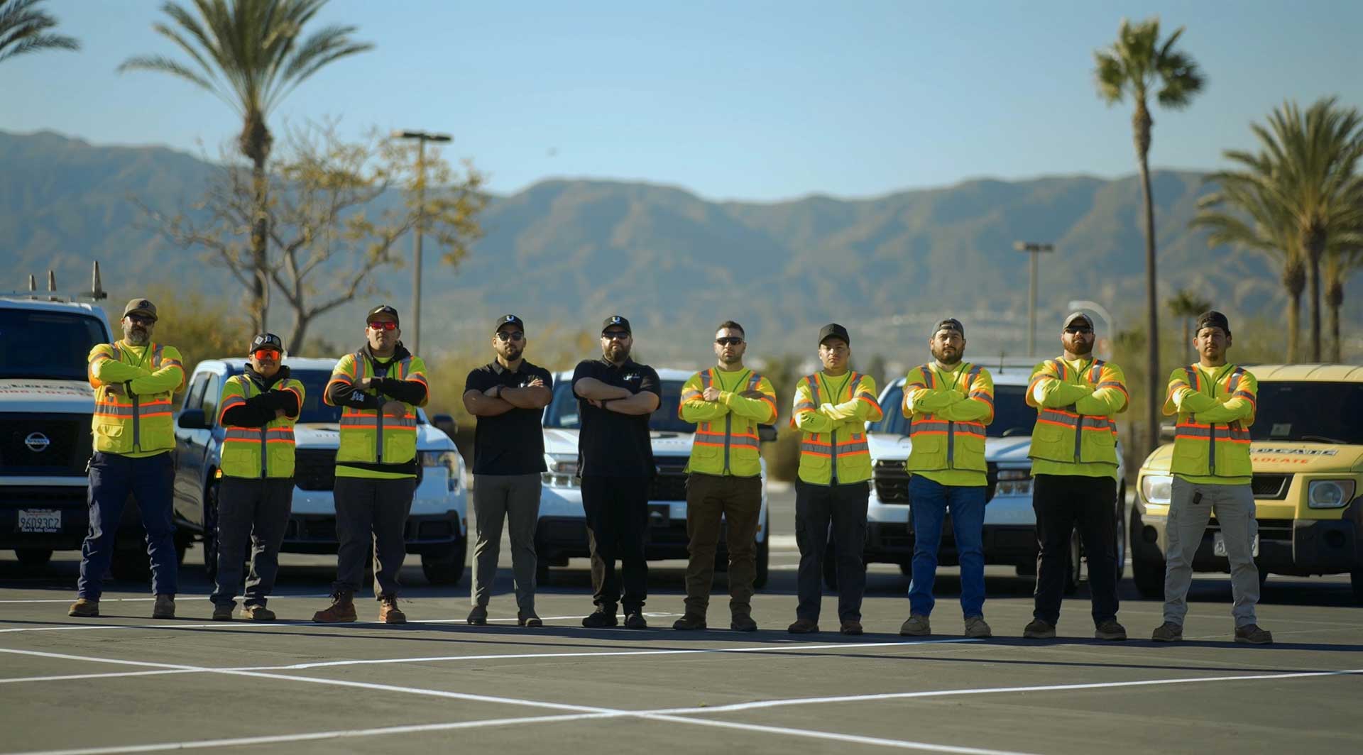 The Util-Locate field team standing in front of company trucks